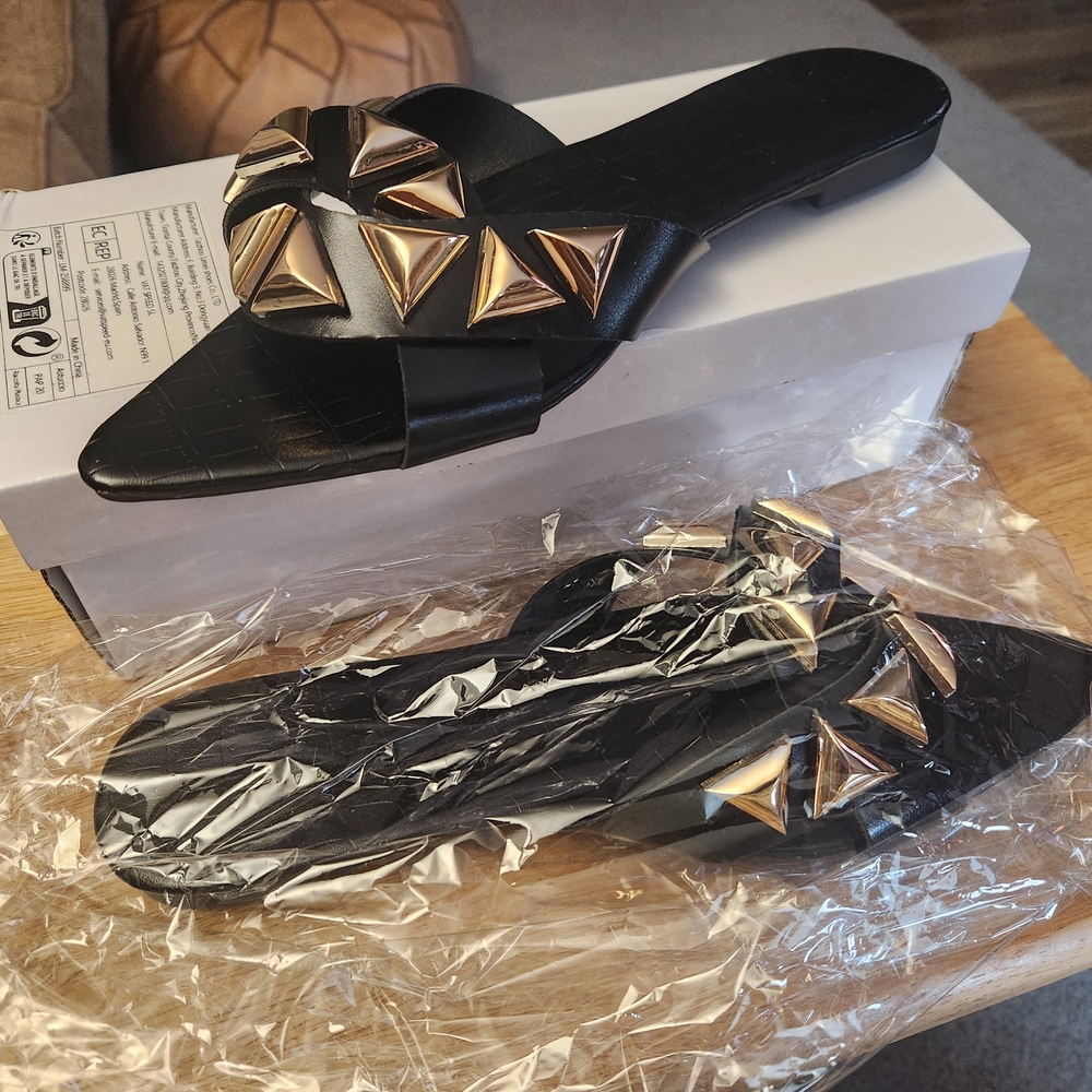 Elegant Black and Gold Sandals with Geometric Design